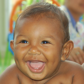 The face of a happy baby   In Cartagena. Colombia  who has received care from the Juan Felipe Gomez Escobar Foundation. 