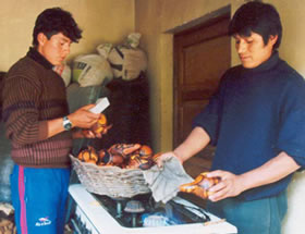 Artisans in Cochas Chico Peru Cleaning and Polishing Carved Gourds Artisans in Cochas Chico Peru Cleaning and Polishing Carved Gourds
